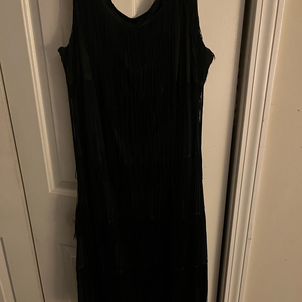 Similar Tina Tina shake it dress black worn 3x at the most.